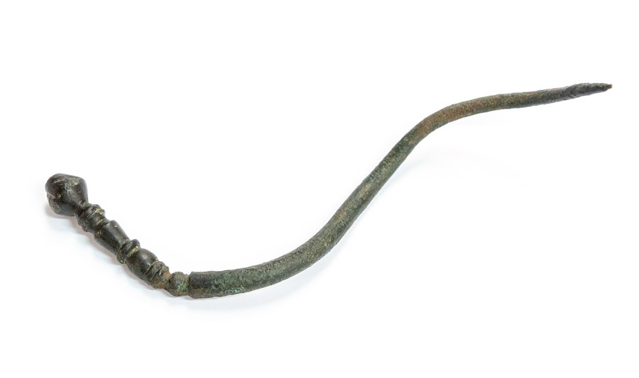 A complete cast copper-alloy probable hairpin of Roman date, c. AD 43-410. This example belongs to