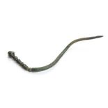 A complete cast copper-alloy probable hairpin of Roman date, c. AD 43-410. This example belongs to