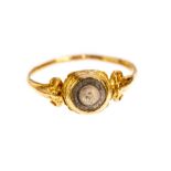 A gold finger ring of probable Post-Medieval date, c. 1550-1650. The ring demonstrates a circular