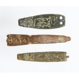 Three incomplete cast copper-alloy Middle Anglo-Saxon strap ends dating c. 750-900 AD. Two of