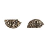 A silver hammered cut halfpenny of Henry I (1100-1135), dating to c. 1105. Annulets and Piles