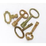 Five cast copper-alloy barrel tap or clock keys of various forms, all probably 19th century.