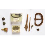A mixed lot of detecting finds. Within this lot, a Late Iron Age La Tene III brooch, a fragment of a