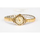 A 9ct gold ladies Bentima watch, round champagne dial, numbers, case diameter approx 20mm, on a gold