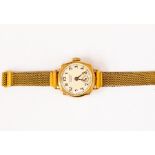 A J.W Benson 9ct gold ladies wristwatch, circa 1930's, round dial, numbers subsidiary dial, dial