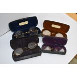 Four cased lorgnettes, mainly late 19th Century, some in yellow metal, in original cases (4)