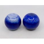 Meissen 1996, pair of blue porcelain spheres, number 479 attributed to Ludwig Zepner