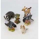 Beswick animal figures including; Badger number 3393, Fawn number 1000B, Blue Tit number 992B matte,