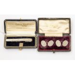 A pair of cased silver cufflinks, Chester 1897, Charles Horner and a modern cased silver tie clip