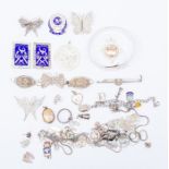 A collection of silver and white metal jewellery to include bracelets, filigree jewellery and