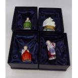 Four boxed Royal Worcester candle snuffers including George and the Dragon, Hush Howard and another
