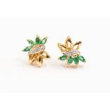 A pair of emerald and 14ct yellow gold diamond earrings,  floral design set with four marquise cut