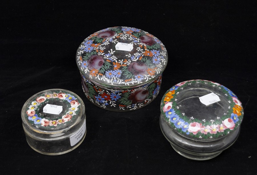 Three early 20th Century Continental hand painted floral pattern glass powder boxes/bowls