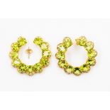 A pair of peridot and diamond earrings, circular scalloped form set with round peridot with a border