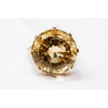 A citrine and 9ct gold ring, round faceted citrine approx 18mm, claw set, size O, total gross weight