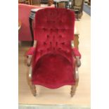 A Victorian red button backed ladies armchair, mahogany