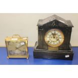 A Mid 20th Century Napoleon shaped mantle clock and Tempora brass carriage clock