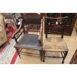 Rush seated ladder back chair and Edwardian leather seated arm chair in the Georgian style.