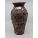 E Wenny studio pottery vase of baluster form, red and cream glaze, incised 'Presented to M and H