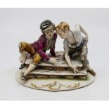 A Capodimonte figure of two boys playing dice on a street, stamped on base