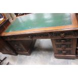 Oak carved pedestal Desk detailing the Green Man.