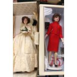 Two Franklin Mint Jackie Kennedy dolls, including red suit for Canadian state visit, designed by