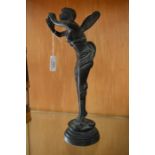 A circa 1960's bronze figurine of an angel
