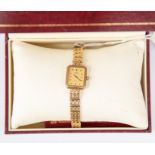 A 9ct gold ladies Rotary watch, rectangular gold tone dial, case size approx 17mm x 15mm,  on a