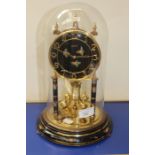 Kundo anniversary clock, 20th Century with floral detail