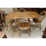 Ercol Drop leaf dining table and four chairs.