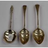 Three hallmarked silver spoons, one with statue on a column handle (3)