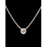 A diamond solitaire pendant, the round old cut diamond weighing approx 0.45ct, rubover setting on