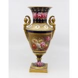 An English porcelain neo-classical style baluster vase, cobalt blue ground decorated panels of