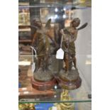 A pair of French bronzed spelter figures La Source and La Prairie signed in the mould (2)