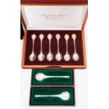 A cased set of The Sovereign Queens Commemorative spoons to include both HM Queen Elizabeths, silver