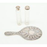 London silver dressing table mirror, two London silver topped glass bottles A/F