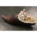 Antique miniature dolls in wooden shoe, mother with five daughters? all with jointed limbs