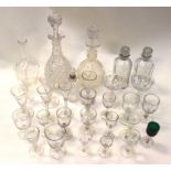 Quantity of glass wear including a pair of hand etched foliage decorated Georgian decanters, further