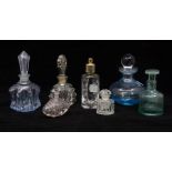 Twelve assorted 20th Century perfume bottles, various shapes and colours and one inkwell