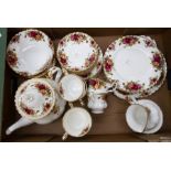 A Royal Albert tea service, including a teapot, plates, small plates, sandwich plates, cups and