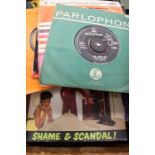 A collection of 45's/records including Slade, Beatles, pop, 60's, Led Zeppelin, Rolling Stones