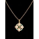 An 18ct gold Victorian style pendant set with turquoise and seed pearl floral decoration, diameter