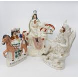 Three late 19th Century Staffordshire ceramic flatbacks, Going to Market, Man on Horseback plus