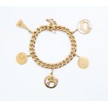 A yellow metal curb link bracelet with various charms, including Aries, a fan, depiction of Venice