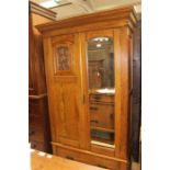 Art Deco mirrored wardrobe, on a drawer base.