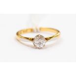 An diamond solitaire ring, claw set round brilliant of approx 0.45 ct, set in platinum with 18ct