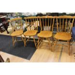 Four pine kitchen chairs.