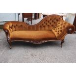 A Victorian mahogany serpentine chaise longue, circa 1870, brown upholstered button back arch