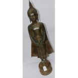 A bronze standing Buddha