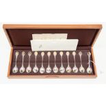 A collection of twelve Royal Society of Birds gilt and silver spoons, London 1975, in presentation